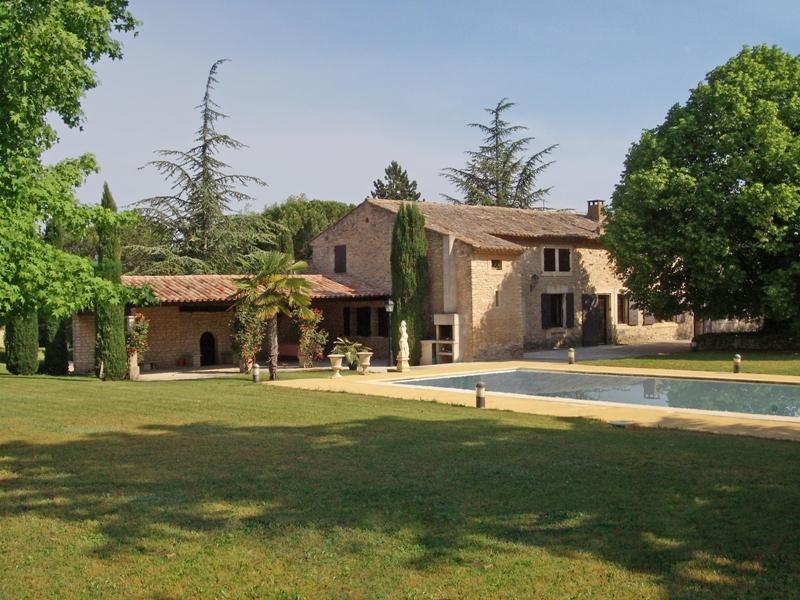 A renovated, enlarged 18th century stone farmhouse, typical Luberon